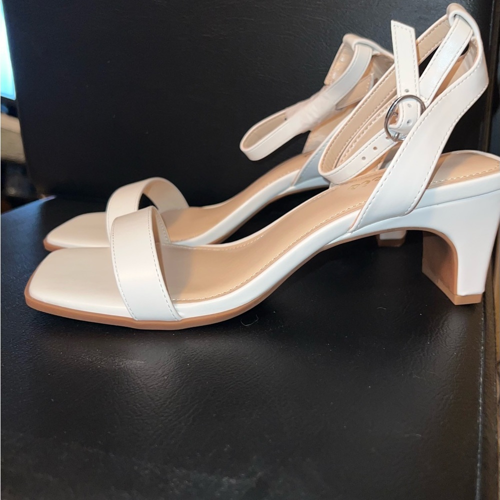 Ankis white heels- in box, never worn!